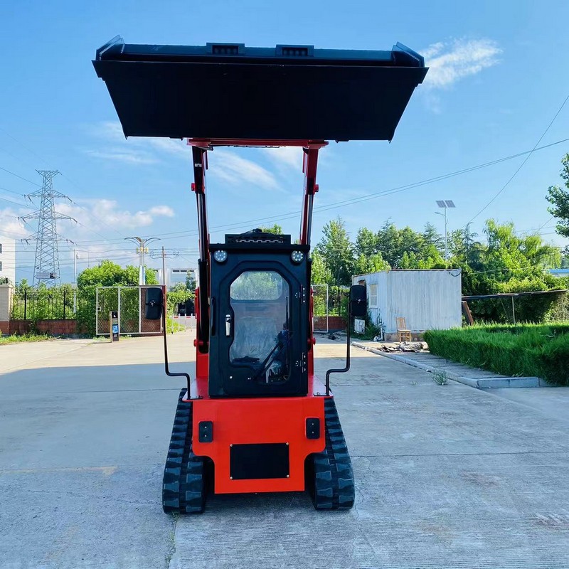 Minicarregadora com rastos de borracha